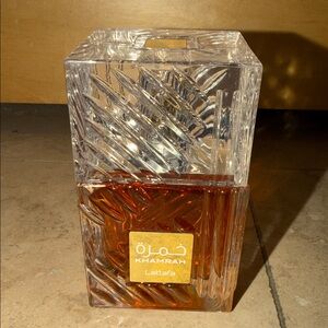 Lattafa Khamrah Fragrance in Clear and Amber Bottle